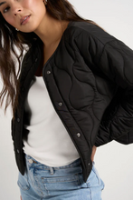Load image into Gallery viewer, STORIES TO BE TOLD | Apex Collarless Puffer Jacket Black | Abbey Road Kaikoura