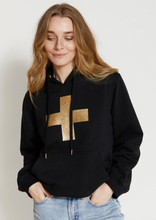Load image into Gallery viewer, Stella &amp; Gemma Black with Gold Glitter Cross Hoody | Abbey Road Kaikoura